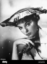 Joan collins 1950s hi-res stock photography and images