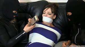 Catsuit Women Kept Wife Bound And Gagged Tight | GagTheGirl