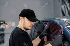 Love wearing black all the time? Professional Car Service Worker Wearing Black Cap And T Shirt Stock Photo Picture And Royalty Free Image Image 144868710