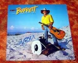 It was released in september 1984 as mca 5512 and was produced by noted country music producer jimmy bowen and represented a concerted shift toward a more country sound by Jimmy Buffett Signed Riddles Sand Album 26201215