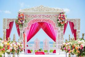 5.wedding stage decoration with beautiful backdrops. Structure Is Very Pretty Probably Would Have Different Colored Curtains And Maybe Less Flowers Indian Wedding Decorations Indian Wedding Planner Wedding Stage