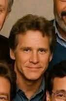 This is the original photo I'm trying to figure out who this man is the one  I cropped to just him we can't figure it out someone tell me