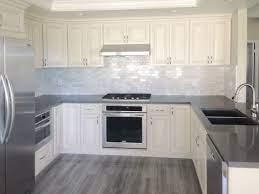 Antique White Kitchen Cabinet With Grey Quartz Countertop Undermount Sink And Pul Antique White Kitchen Antique White Kitchen Cabinets Antique White Cabinets