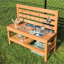 As the name suggests, it makes use of mud and water or any other ingredient that can be found in your garden. Outdoor Mud Kitchen With Pump