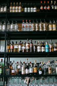 Alcohol On Shelves At Cafe Birdie In L A Sfgirlbybay Cafe Interior Design Cafe Design Bistro Design
