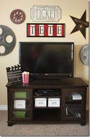 This large, admit one movie ticket tin metal wall sign measures 12 long and 8 wide, and features prominent and embossed stub numbers, lettering and stars to look. 68 Movie Themed Decor Ideas Movie Room At Home Movie Theater Movie Room Decor