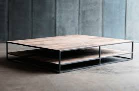 The table is made of solid sheesham wood. Large Coffee Table Made In Old Teak And Brushed Metal