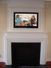 See more ideas about fireplace, tv above fireplace, fireplace design. 12 Framed Tv Ideas Framed Tv Tv Above Fireplace Wall Mounted Tv