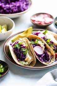 To sear the fish, heat the remaining 1 tablespoon olive oil in a large skillet over high heat until sizzling. Grilled Fish Tacos With Avocado Cilantro Sauce Kitchen Confidante