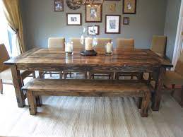In order to make a finer and warmer dining room decor, reclaimed wood chairs and at least a bench will do it great. Farmhouse Dining Table With Bench Ideas On Foter