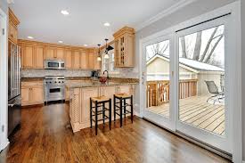 The kitchen interior design at the time being is no longer a simple concept of interior design with small amount of items. Breakfast Bar And Sliding Glass Doors To Deck Leading To Backyard Kitchen Remodel Kitchen Flooring Sliding Glass Door