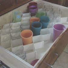 This is good way to create something like a tea or coffee station as well. Sock Dividers Used To Hold Drinking Glasses In A Deep Kitchen Drawer This Kitchen Had No Kitchen Drawers Kitchen Drawer Organiser Kitchen Drawer Organization