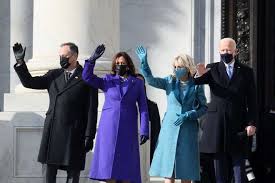 The formal dress and matching coat worn by first lady jill biden wednesday night for inaugural festivities were designed with inspiration from new administration's message of unity, says the designer gabriela hearst. President Biden Launches Policy Changes Calls For National Unity On Historic 1st Day In Office