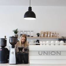 Specialty coffee roaster based in the heart of seattle. Logo Union Coffee On Behance