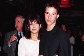 Sandra Bullock and Keanu Reeves Photos Together Through the Years