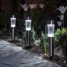 Solar Powered Lights Are Useful For Lighting A Garden Path At Night Or In Decorative Multi Coloured Versions To Mak Solar Lights Garden Garden Lighting Lights