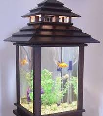 Les Aquariums Les Plus Dingues Qui Donnent Envie D Avoir Des Poissons Aquariums Voliere D Oiseaux Aquarium