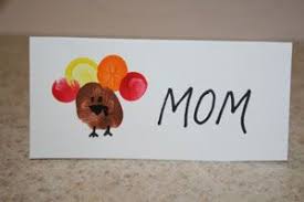 Place cards make sure you have total control of the seating (no more family drama!), plus they just look good on your table. Fingerprint Turkey Place Card Turkey Place Cards Thanksgiving Place Cards Thanksgiving Crafts For Kids