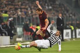 Born 14 august 1984) is an italian professional footballer who plays as a defender and captains both serie a club juventus and the italy. Giorgio Chiellini Edin Dzeko Giorgio Chiellini And Edin Dzeko Photos Zimbio