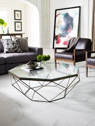 There are a couple small scuffs but overall it is excellent! Geometric Coffee Table In Antique Brass Burke Decor