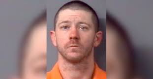 Man charged with having machete