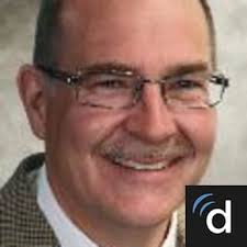 Dr. Alan K. Dacre, MD