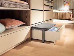 A toe kick step stool tucks away out of sight, and makes wall cabinets accessible for everyone. Blum Takes Storage To New Levels With Space Step Eboss