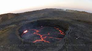 Erta ale is a continuously active basaltic shield volcano in the afar region of northeastern ethiopia, the most active encyclopédie universelle. Fly Over An Active Lava Lake Erta Ale Volcano Ethiopia Youtube