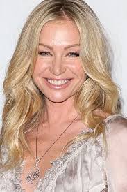 Portia de Rossi chops off her signature long locks