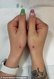 Billie eilish's tattoos that you can filter by style, body part and size, and order by date or score. Canberra Student D Kodia Laine 23 Gets Left And Right Tattoos On Her Hands Daily Mail Online
