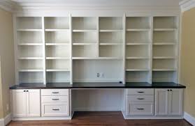 Custom Built In Desk With Shaker Style Doors And Drawers Adjustable Shelves Stained Wooden Countert Home Office Cabinets Built In Desk Built In Computer Desk