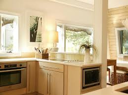 The only dates available for auction pick up is july. White Contemporary Kitchen With Blonde Wood Cabinets Hgtv