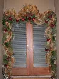 Front Door Garland Using 21 Deco Mesh And Wired Ribbon And Tucking In Some Fresh Greenery By Sylharden Christmas Door Decorations Christmas Deco Mesh Garland