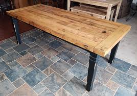 This farmhouse table is made from reclaimed oak. Custom Oak Thick Top Farm Table With Comapny Boards By Flying Pigs Furniture Llc Custommade Com