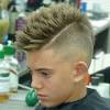 Add some modern style to a cool kids mohawk by incorporating a hair design. 3