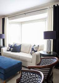 Curtains can accentuate the height of a room and also frame the shape of windows and doors so that they don't appear unadorned. Curtain Ideas For Bay Windows And Other Strange Arrangements The Homes I Have Made