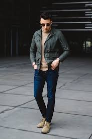 Olive Green Rain Coat Tan Sweater Skinny Jeans Tan Chukka Boots Mens Fashion Inspiration Mens Coats Tan Chukka Boots