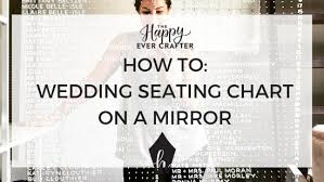 how to do a wedding seating chart on a mirror the happy