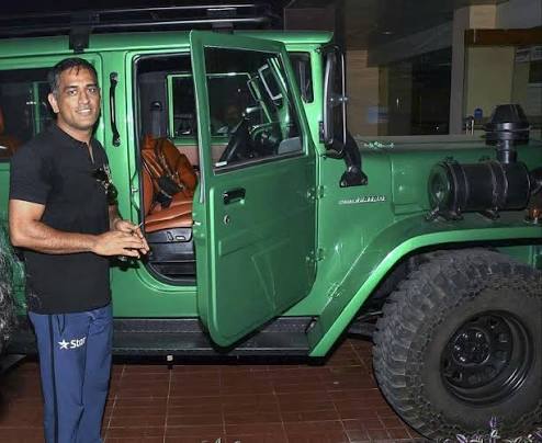 MS Dhoni poses with his green machine, Nissan Jonga.