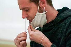 The swab remains in place briefly before being gently rotated as it's pulled out. F D A Authorizes First At Home Coronavirus Test The New York Times
