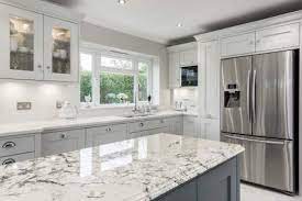 For subtle contrast, two different shades of the same calm colour tend to work better on cabinetry than three or four, which can look like a design mistake. Light Grey Shaker Kitchen With Classic Styling