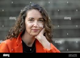 Potsdam, Germany. 06th July, 2024. Author Iris Wolff stands in the park of  Villa Jacobs at the Potsdam literature festival "LIT:potsdam". The motto of  the festival from 02.07. to 07.07.2024 is "Forward