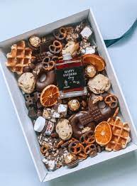 A mixed sweet and savoury grazing box starts at $50 and includes one half filled with lollies, chocolate, biscuits and donuts/small cakes and the other half with cheese, cured meat, dips, olives, crackers, fresh fruit and vegetables. 32 Best Father S Day Grazing Boxes Melbourne Tot Hot Or Not