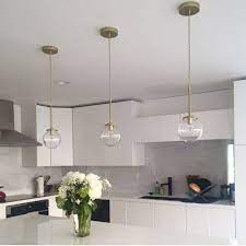 Where you might typically find a kitchen island being illuminated from one source of light, mini pendants allow you to achieve the same lighting effect from multiple points of light. Glass Pendant Light Fixtures For Charming And Classic Choice Glass Globe Pendant Light Kitchen Lighting Fixtures Modern Light Fixtures