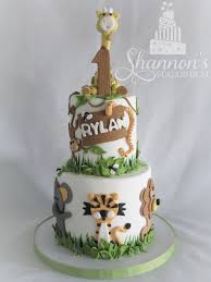 Theme Birthday Cake For Little Boy 2 Tier Zoo Theme Cake For A Little Boy Turning 1 Red Velvet Cake With Cream Cheese Flavour Butte Jungle Birthday Cakes Safari Birthday Cakes New Birthday Cake