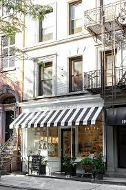 Nyc Guide The Laundress York Avenue Storefront Design Cafe Exterior Cafe Interior Design