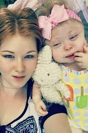 Mum desperately makes memories for girl who will die in a year