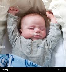 Seven Weeks Old Baby Boy Asleep In Cot Uk Stock Photo Alamy