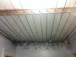 Car mounted storage rack fishing rod holder fishing rod holder strap storage carrier belt for suv van. My Dad Made These Ceiling Mount Fishing Rod Racks For Me All Reclaimed Construction Even The Screws Fishing Rod Rack Diy Fishing Rod Diy Fishing Rod Holder