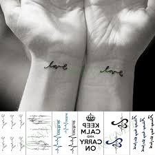 Ink blots are used to create the outline of the heart while smears of vivid pinks and purple color the tattoo. Waterproof Temporary Tattoo Sticker Love Letter Heartbeat Fake Tatto Hand Arm Foot Flash Tatoo For Kid Girl Men Women Buy At The Price Of 1 99 In Aliexpress Com Imall Com